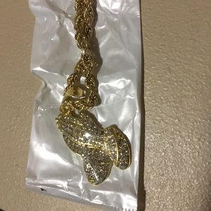 Gold chain with praying hands